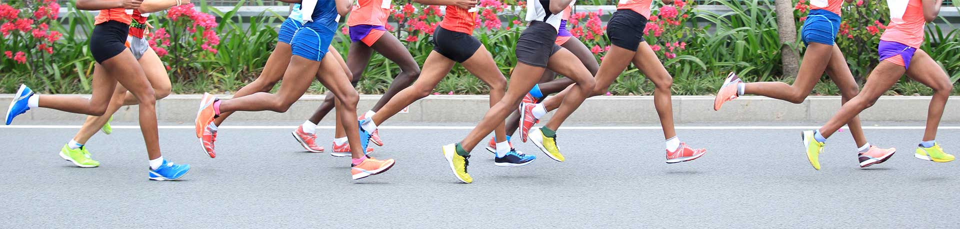 Marathon running race, people feet on city road